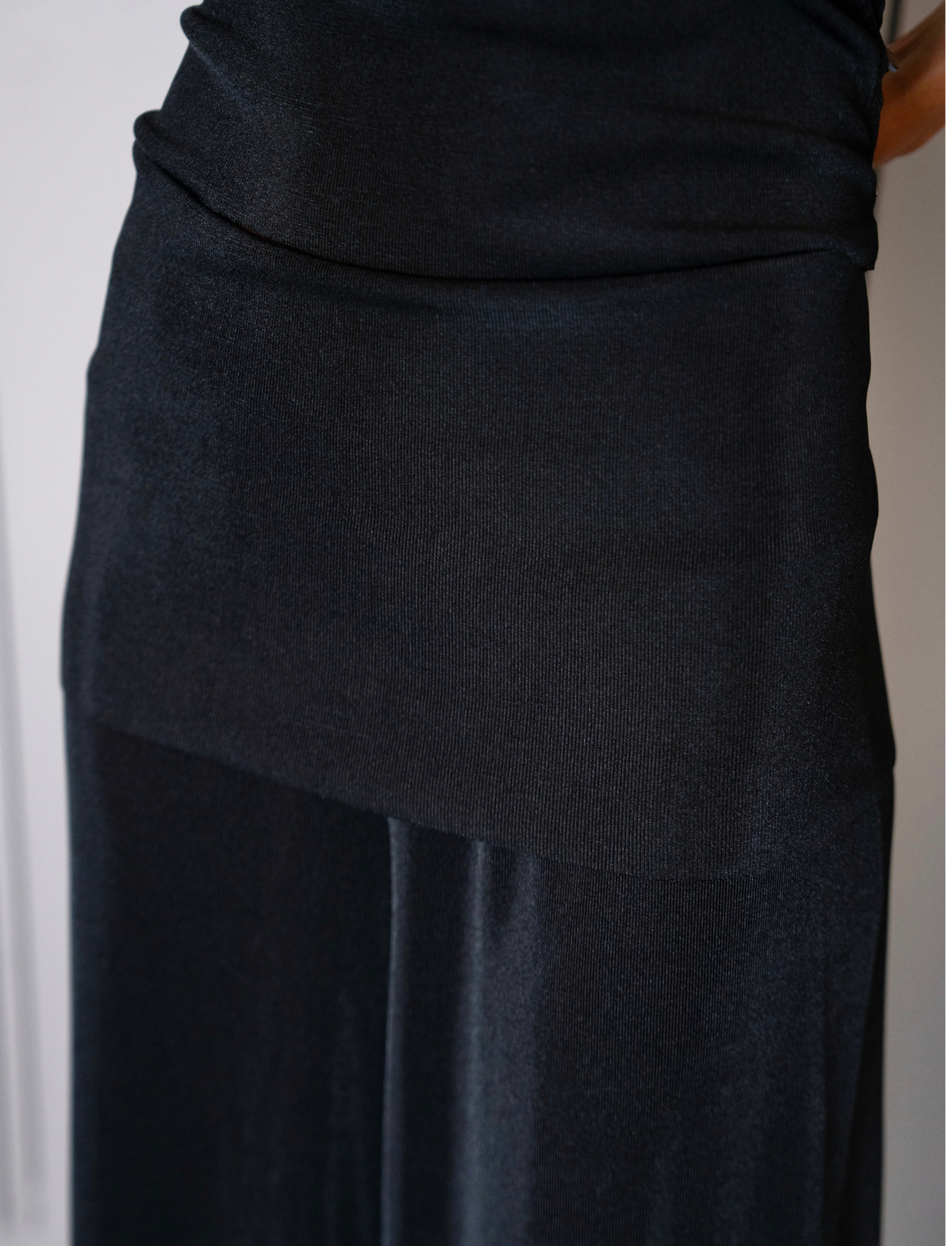 Conjunto em Malha Calça Pantalona com Saia Sobreposta