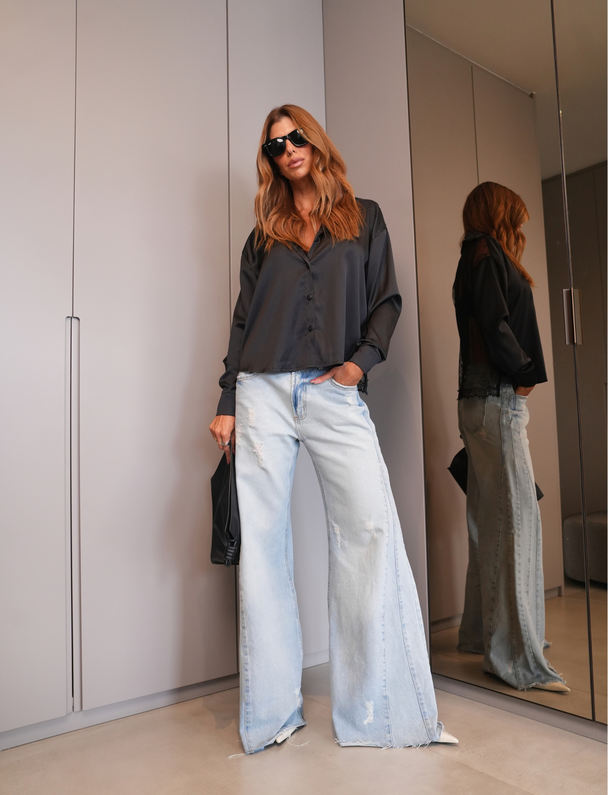 Calça Jeans Cintura Baixa Pantalona com Recorte
